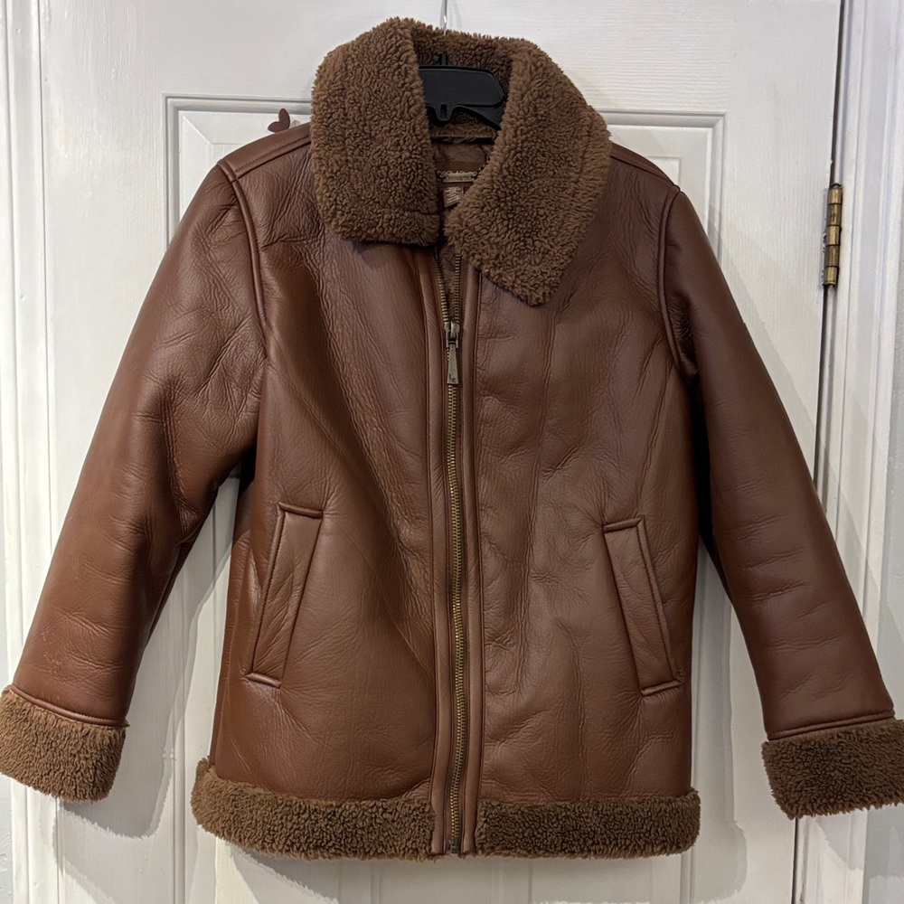 Koolaburra Brown Faux Leather with Shearling coat. In like new condition